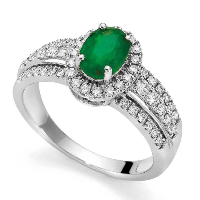 18-karat white gold ring with oval emerald and pavé diamonds